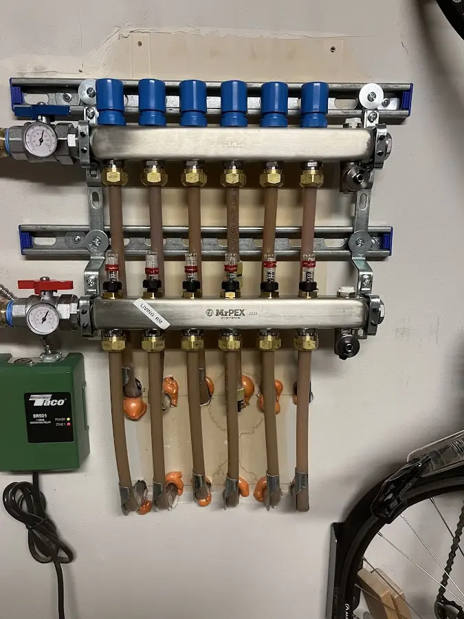 Plumber performing Water Heater Repair at a residential property in Ripley